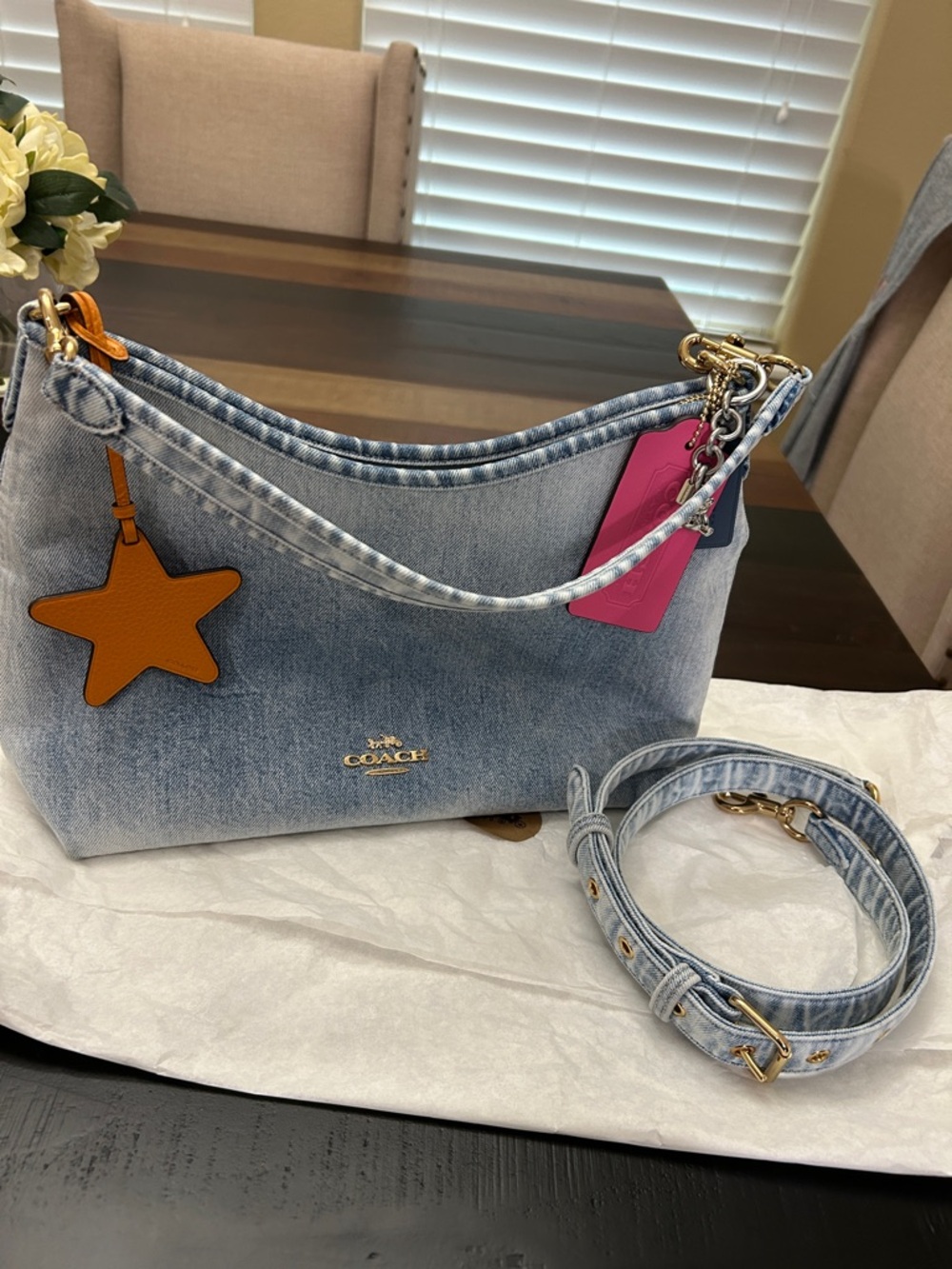 Coach Loved denim Laurel New without tags. Never worn.